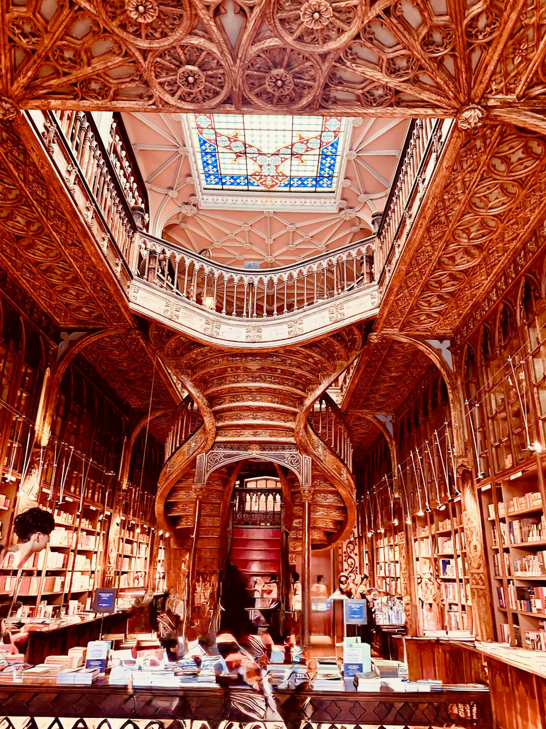 Old library interior with tall wooden bookshelves